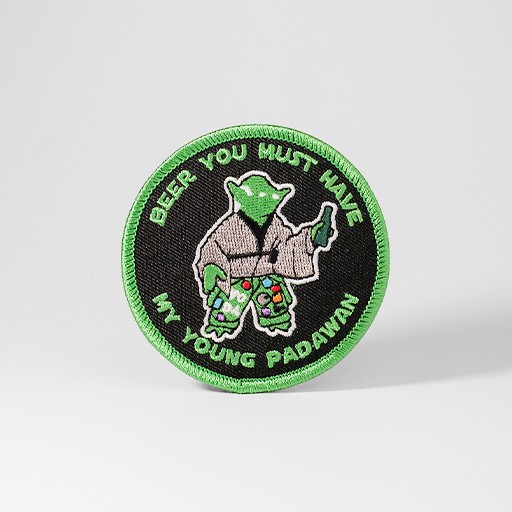 Grönt tygmärke med texten "Beer You Must Have, My Young Padawan"